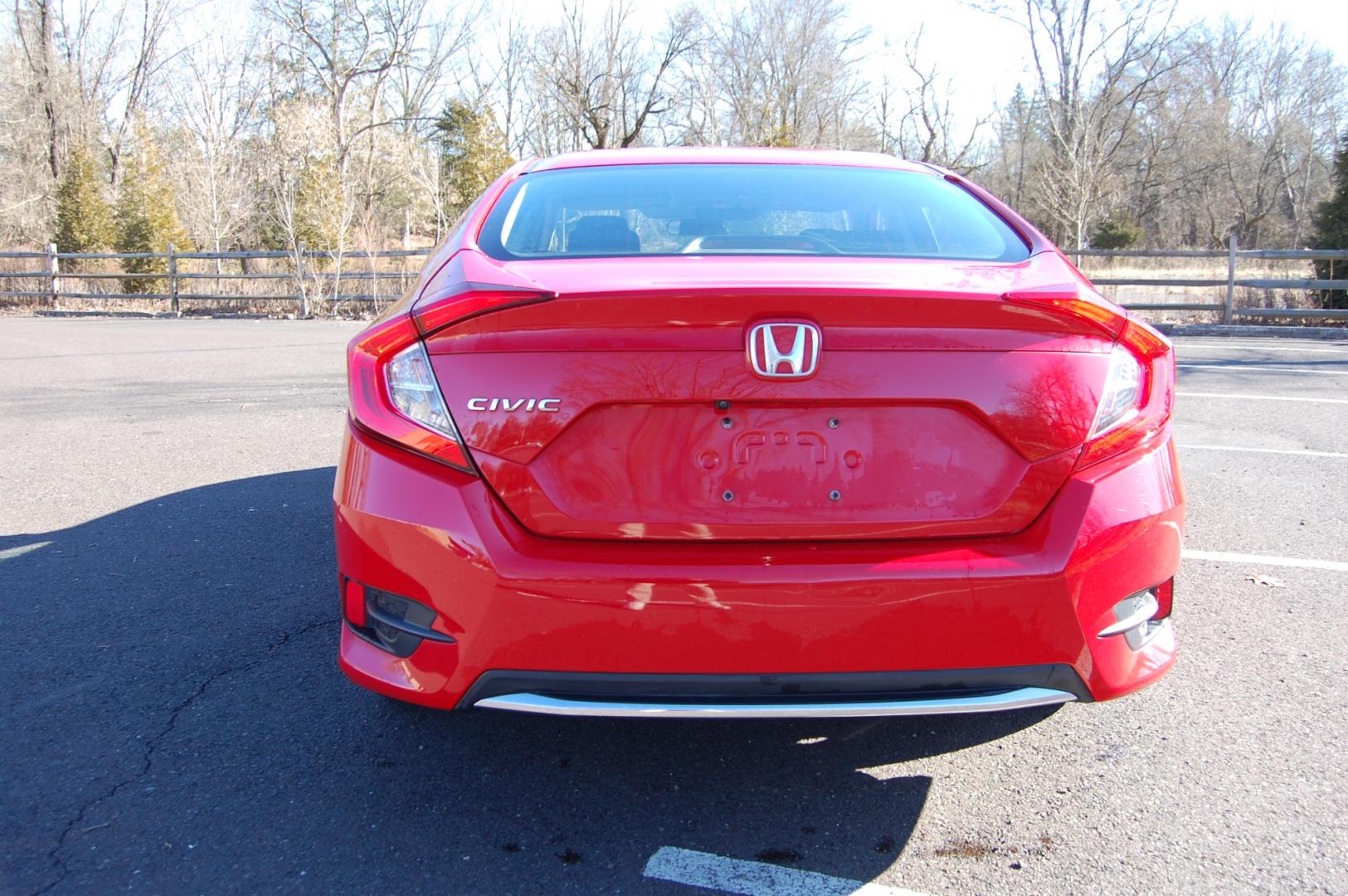 2019 RED /Black Cloth Honda Civic (2HGFC2F60KH) with an 2.0 Liter engine, Automatic transmission, located at 6528 Lower York Road, New Hope, PA, 18938, (215) 862-9555, 40.358707, -74.977882 - One family owned 2019 Honda Civic LX sedan powered by a 2.0 Liter 4 cylinder engine, front wheel drive, automatic transmission. Tilt wheel, cruise control, Dual front and side air bags, Side curtains airbags, ABS braking, AM/FM/Bluetooth/USB, Auto climate control, power windows, locks and mirrors, 1 - Photo#7